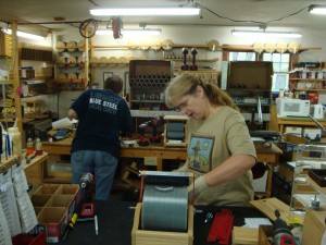 A photo of Liz and Carol building machines in the upper shop. 