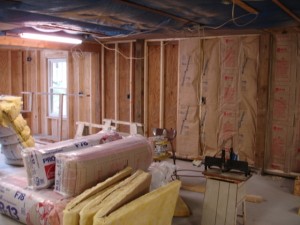 Installing the insulation in the lower shop. 