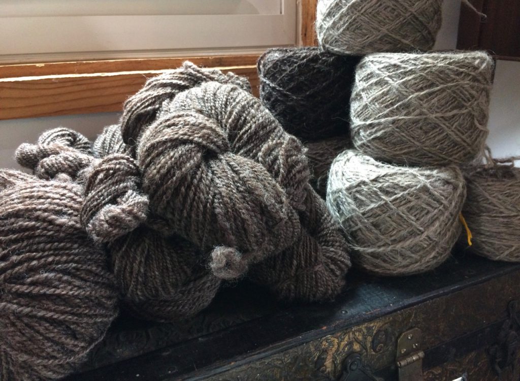 skeins are from a Romney fleece. Don’t remember what the balls are, but the light grey is very soft. All were carded on a Strauch, and the balls wound on a Jumbo Ball Winder