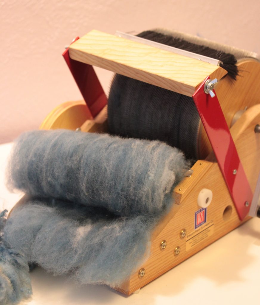 This heathered blue batt was made easily on the Strauch Petite Drum Carder.