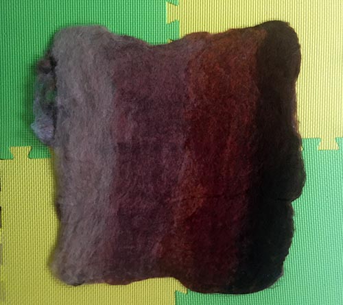 How to Wet Felt Coasters from Carded Batts - lay felted batt flat to dry